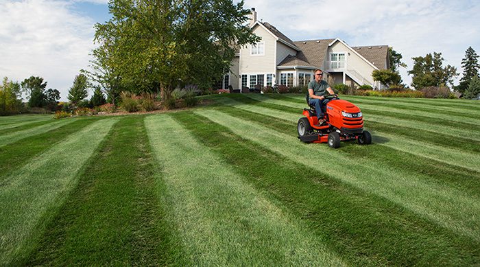 How Do You Stripe Your Yard With a Riding Lawn Mower?