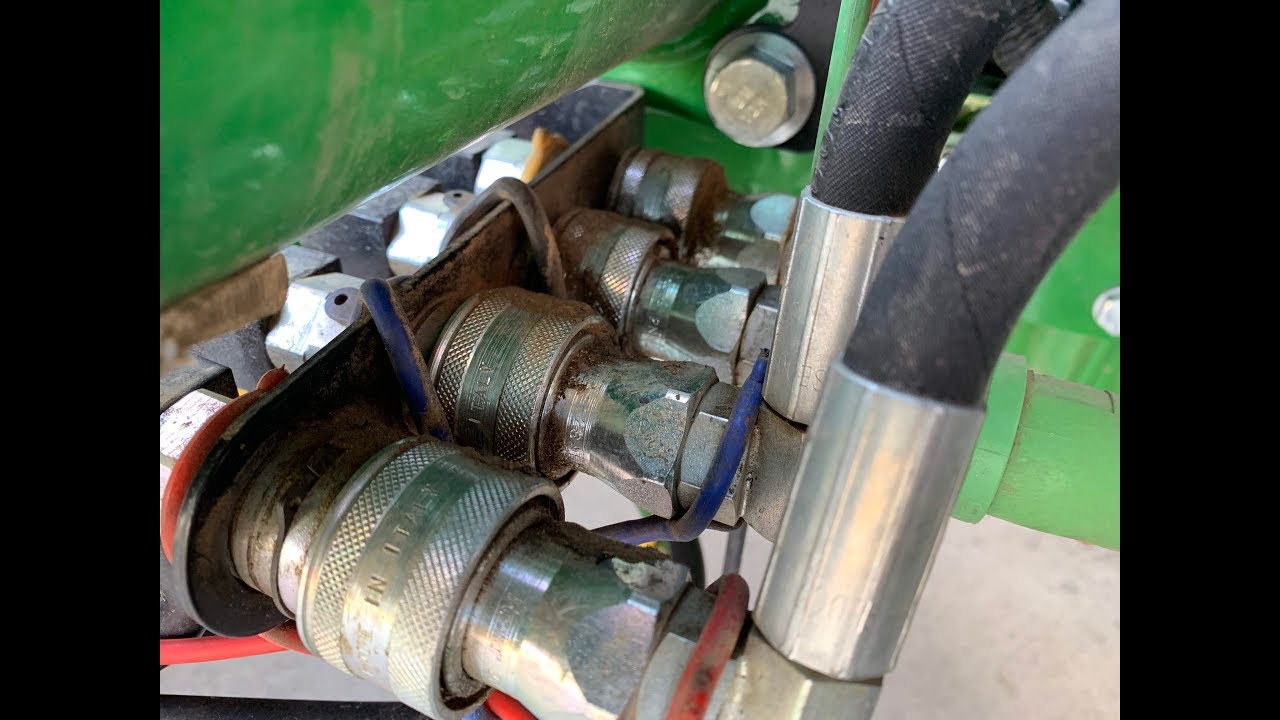 How to Disconnect Hydraulic Hose from John Deere Tractor