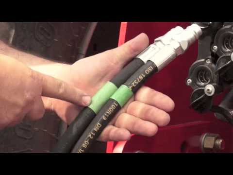How to Hook Up Hydraulic Hoses on a Tractor