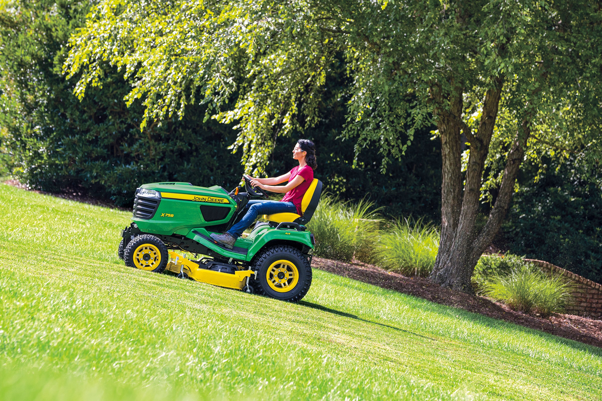 How to Mow a Steep Hill With a Lawn Tractor